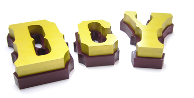 closeup of spray painted mdf letters